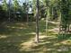 Backyard featuring trees and space for recreation at 209 Falcon Dr, Concord, NC 28025