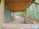 Barn interior with wooden beams, providing a rustic and sheltered space with secure fencing at 209 Falcon Dr, Concord, NC 28025