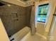Updated bathroom featuring neutral tile, and a tub shower at 209 Falcon Dr, Concord, NC 28025