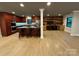 Spacious kitchen with hardwood floors and a large island with barstool seating at 209 Falcon Dr, Concord, NC 28025