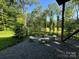Picturesque outdoor space featuring a charming fire pit area, great for entertaining at 209 Falcon Dr, Concord, NC 28025