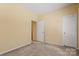 Carpeted bedroom with white doors and neutral paint at 212 Township Dr, Fort Mill, SC 29715