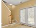 Foyer with staircase and double doors leading to outdoor space at 212 Township Dr, Fort Mill, SC 29715