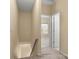 Upstairs hallway with carpet flooring and a view of the bedroom at 212 Township Dr, Fort Mill, SC 29715