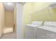 Laundry room with washer and dryer hookups, and a storage shelf at 212 Township Dr, Fort Mill, SC 29715