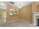 Bright living room featuring an archway to the kitchen with stainless steel appliances at 212 Township Dr, Fort Mill, SC 29715