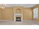 Inviting living room with fireplace and built in alcove above at 212 Township Dr, Fort Mill, SC 29715