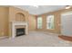 Comfortable living room with neutral walls, modern ceiling fan and cozy fireplace at 212 Township Dr, Fort Mill, SC 29715