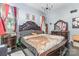 Main bedroom features a large bed, stylish decor, and ample natural light at 2133 Highland View Ln, Charlotte, NC 28214