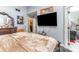 Bedroom showcasing a large bed, TV, closet access, and stylish decor at 2133 Highland View Ln, Charlotte, NC 28214