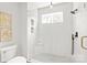 Sleek bathroom showcasing a glass-enclosed shower with tiled walls, and modern fixtures at 2733 Cowles Rd, Charlotte, NC 28208