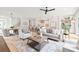 Spacious living room with hardwood floors and open to the kitchen and dining area at 2733 Cowles Rd, Charlotte, NC 28208