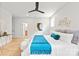 Airy main bedroom features wood floors, recessed lighting and entry to the ensuite bathroom at 2733 Cowles Rd, Charlotte, NC 28208