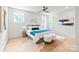 Bright primary bedroom featuring wood floors, recessed lighting, and stylish decor at 2733 Cowles Rd, Charlotte, NC 28208