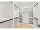 Organized walk-in closet with ample shelving and hanging space, maximizing storage at 2733 Cowles Rd, Charlotte, NC 28208