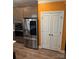 This modern kitchen has stainless steel appliances, a double-door pantry, and wood-look flooring at 2810 Shumard Dr, Gastonia, NC 28054