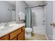 Well-lit bathroom with a shower-tub combo and a classic vanity at 3414 Broadwick St, Charlotte, NC 28213
