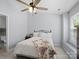 Bright bedroom with a comfortable bed, soft lighting, and a scenic view from the window at 3414 Broadwick St, Charlotte, NC 28213