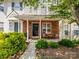 Charming townhome with a brick facade, covered porch, and inviting curb appeal at 3414 Broadwick St, Charlotte, NC 28213