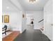 Open foyer with slate flooring leading to living spaces and a staircase at 3701 Table Rock Rd, Charlotte, NC 28226