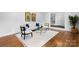 Inviting living room featuring hardwood floors, a white sofa, and stylish furnishings at 3701 Table Rock Rd, Charlotte, NC 28226