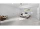 Inviting primary bedroom with a modern design and accent lighting at 3701 Table Rock Rd, Charlotte, NC 28226