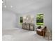 Bright primary bedroom with two windows and a decorative wall mirror at 3701 Table Rock Rd, Charlotte, NC 28226