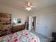 Bright bedroom featuring a ceiling fan, dresser, and decorative accents, creating a cozy and inviting space at 4032 Wilgrove Way Dr # 252, Charlotte, NC 28213