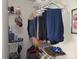Well-organized closet with shelving and hanging clothes at 4032 Wilgrove Way Dr # 252, Charlotte, NC 28213