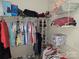 Walk-in closet featuring metal shelving for storing clothes and shoes, maximizing organization at 4032 Wilgrove Way Dr # 252, Charlotte, NC 28213