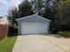 Side view of a detached two car garage with ample parking on a sunny day at 4032 Wilgrove Way Dr # 252, Charlotte, NC 28213