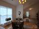Cozy living room area with hardwood floors, high ceilings and lots of natural light at 4032 Wilgrove Way Dr # 252, Charlotte, NC 28213