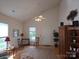 Bright living room with vaulted ceilings, hardwood floors, and neutral decor at 4032 Wilgrove Way Dr # 252, Charlotte, NC 28213