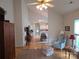 Cozy living room with vaulted ceilings, hardwood floors, and open access to kitchen area at 4032 Wilgrove Way Dr # 252, Charlotte, NC 28213