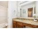Bathroom featuring granite countertop vanity, decorative mirror, and shower-tub combination at 4068 Sherri Ln, Fort Mill, SC 29715