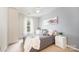 Comfortable bedroom featuring a ceiling fan, window with natural light, and soft gray decor at 4068 Sherri Ln, Fort Mill, SC 29715