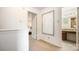 Bright hallway with neutral tones, connecting to a bedroom and bathroom with vanity at 4068 Sherri Ln, Fort Mill, SC 29715