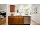Well-appointed kitchen featuring granite countertops, stainless steel appliances, and wooden cabinetry at 4068 Sherri Ln, Fort Mill, SC 29715