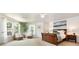 Spacious main bedroom with large windows, decorative plant and an inviting bed at 4068 Sherri Ln, Fort Mill, SC 29715