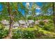 Expansive backyard showcasing the home's exterior, landscaping, and outdoor seating areas at 4313 Wynborough Ln, Charlotte, NC 28269