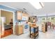 Bright kitchen with light wood cabinets, an island and adjacent breakfast nook at 4313 Wynborough Ln, Charlotte, NC 28269