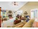 Open-concept living area with hardwood floors, vaulted ceilings, comfortable sofas, and lots of natural light at 4313 Wynborough Ln, Charlotte, NC 28269