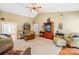 Inviting living room showcasing hardwood floors, vaulted ceilings, comfortable furniture, and smooth transition to other rooms at 4313 Wynborough Ln, Charlotte, NC 28269