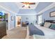 Large main bedroom offers neutral carpet, blue walls and trey ceiling at 4313 Wynborough Ln, Charlotte, NC 28269