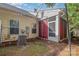 View of the home's backyard featuring an HVAC unit and screened in porch at 460 Clouds Way, Rock Hill, SC 29732