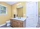 Bathroom featuring a single sink vanity and white toilet and linen closet at 460 Clouds Way, Rock Hill, SC 29732