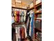 Walk-in closet with multiple shelves filled with clothing and storage boxes at 460 Clouds Way, Rock Hill, SC 29732