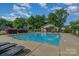 Community pool with lounge chairs, pool house and splash fountain for children at 460 Clouds Way, Rock Hill, SC 29732