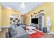 Cozy living room with contemporary furnishings, decorative accents, and wood flooring at 460 Clouds Way, Rock Hill, SC 29732