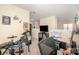 Entertainment bonus room space featuring beige walls and carpet with music decor at 4703 David Cox Rd, Charlotte, NC 28269